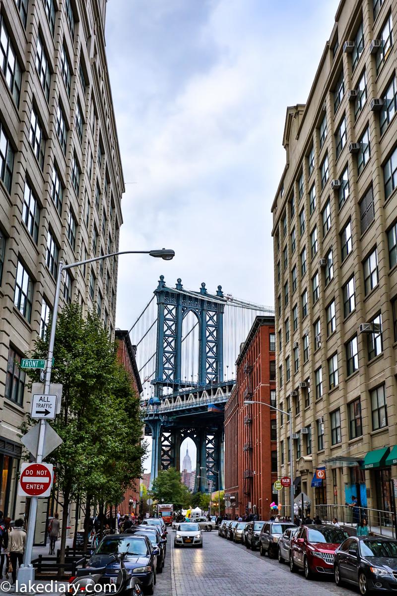new york: View of Manhattan Bridge from Brooklyn – can you spot the Empire State Building?  