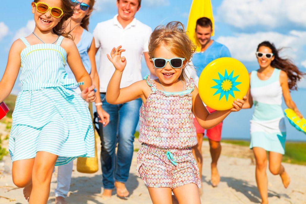 Multiracial-group-of-friends-walking-at-the-beach-586702206_3109x2073_preview.jpeg